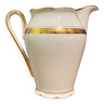 Pot à lait en porcelaine à décor or sur fond blanc