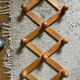 Vintage accordion wall coat rack