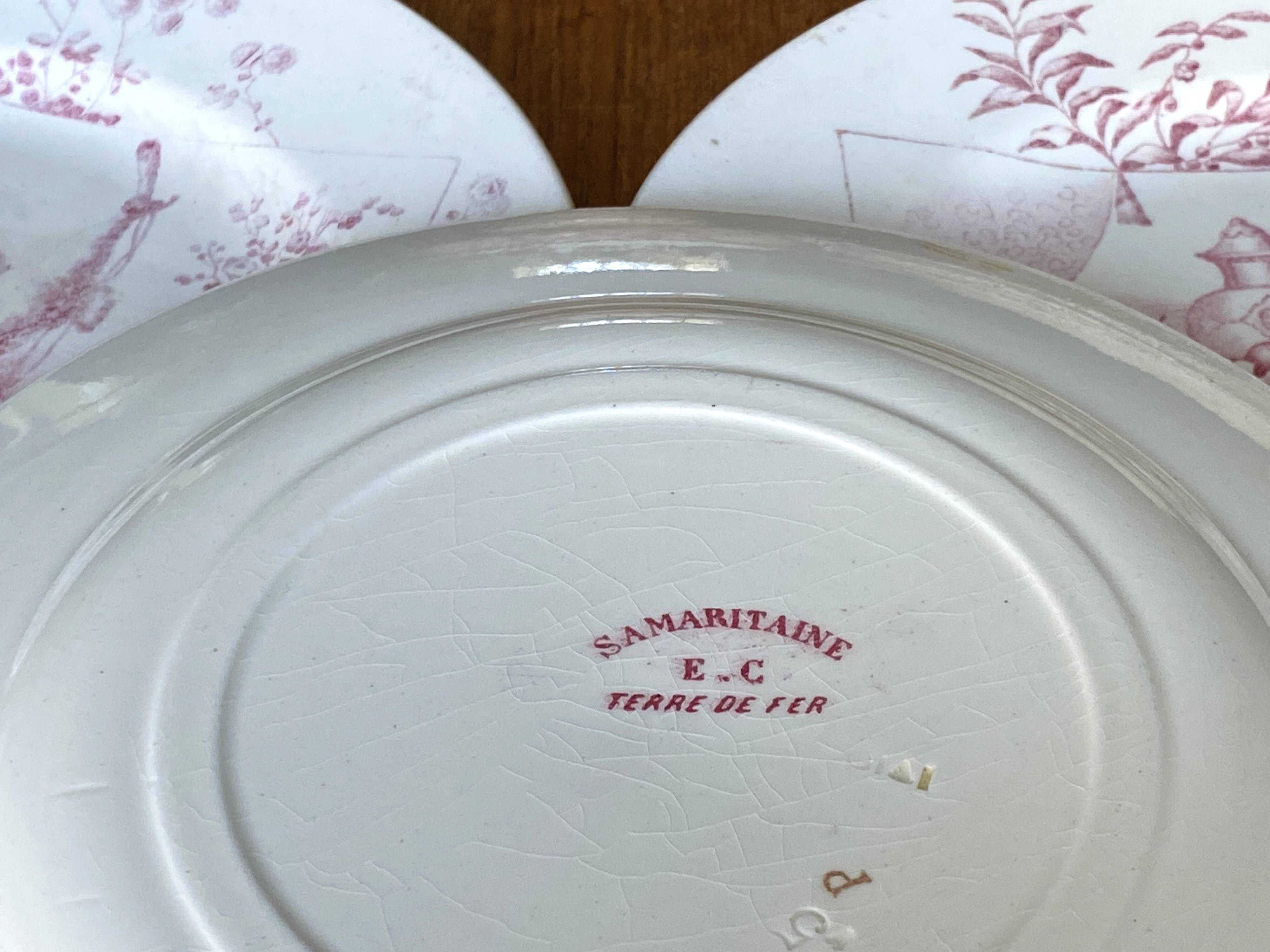 Set of 9 red earthenware plates from Terre de Fer Samaritaine - 19th century.