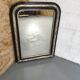 Mirror Louis-Philippe black wood and silver carved