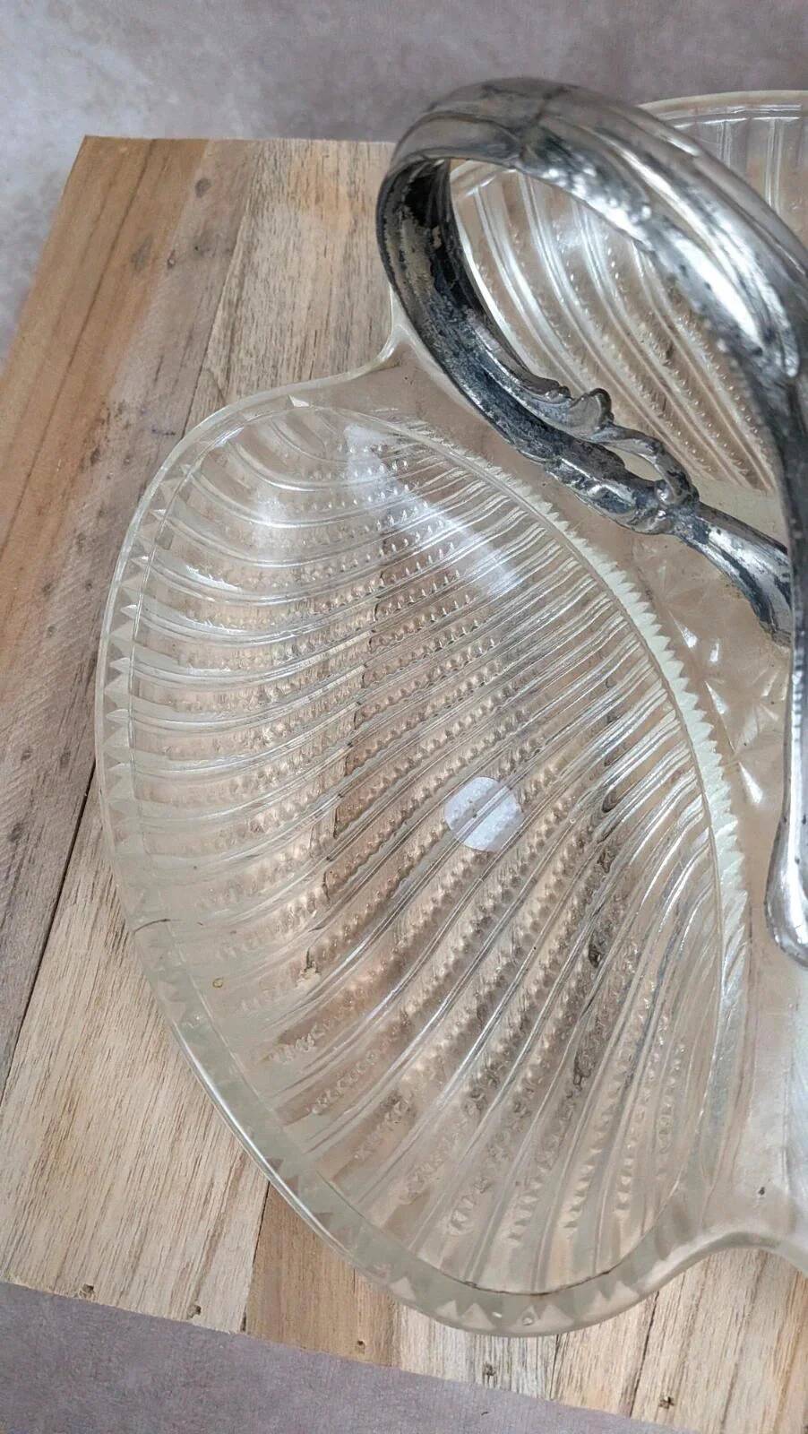 Vintage glass serving tray with silver-plated handle.