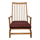 Rocking chair in oak with fabric cushion, Denmark, 1960.