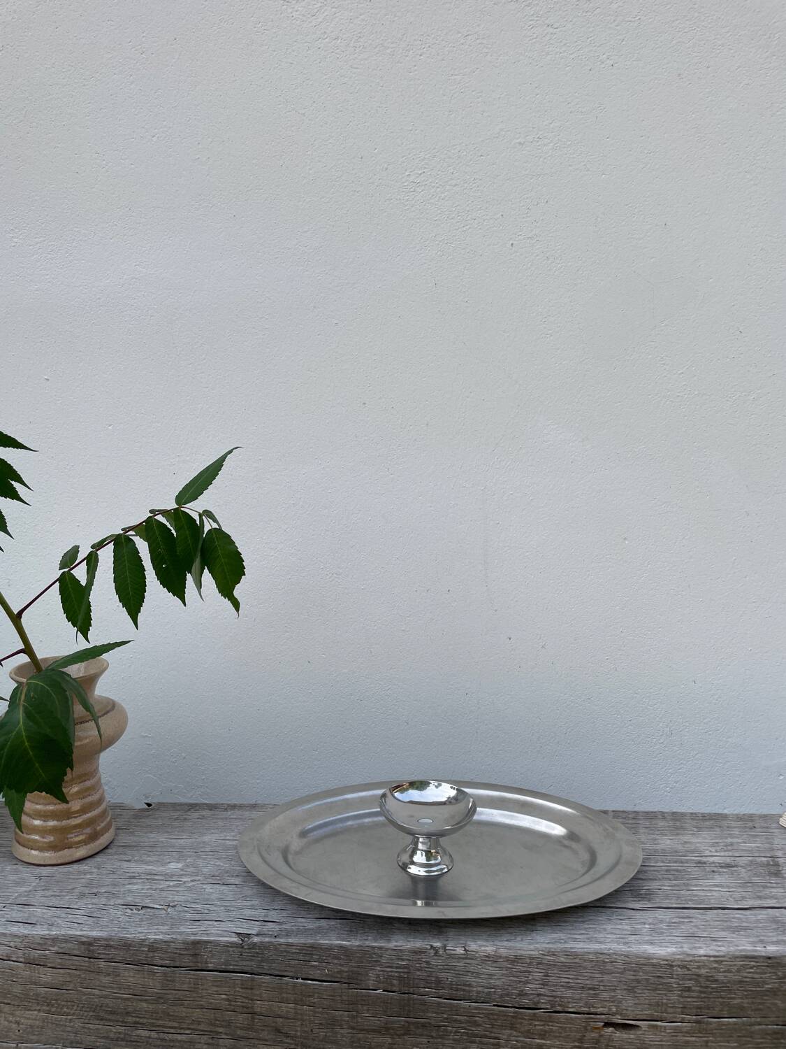 Oval stainless steel dish, signed Rémi Letang