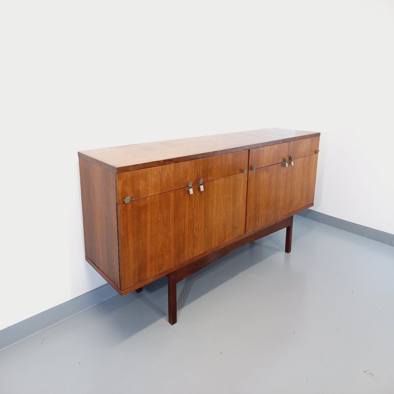 Vintage Scandinavian style row in rosewood and brass from the 60s