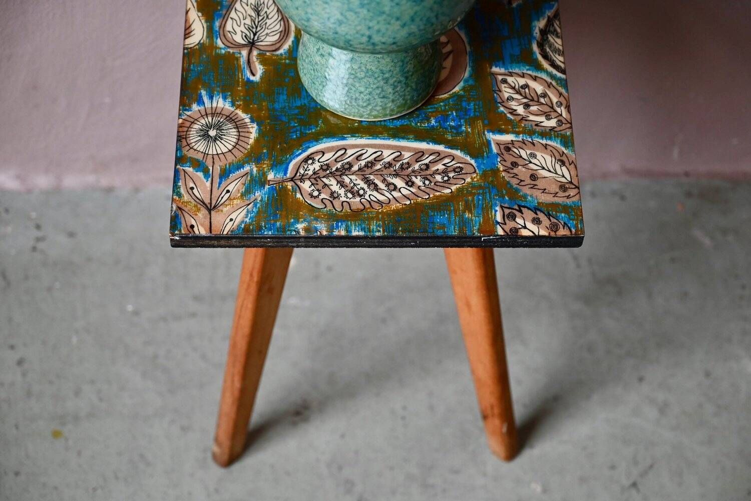 Plant stand side table 1970s Scandinavian patterns with tapered legs.