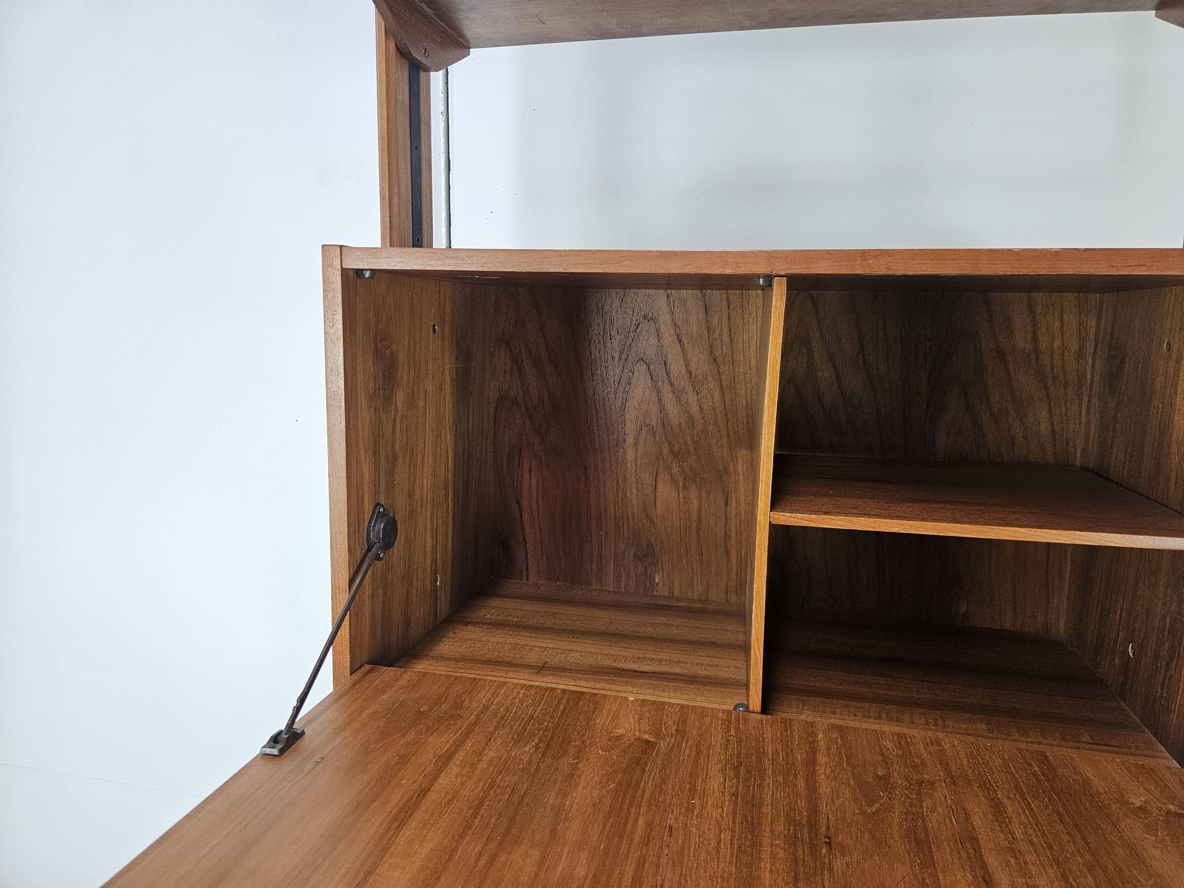 1960s teak floor/sky bookcase with shelves and compartment