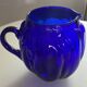 Vintage cobalt blue glass pitcher by Henry Dean