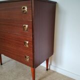 Chest of drawers with spindle legs