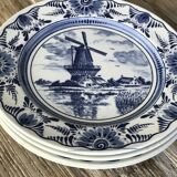 Lot of 4 dessert plates in white porcelain and Dutch mill design