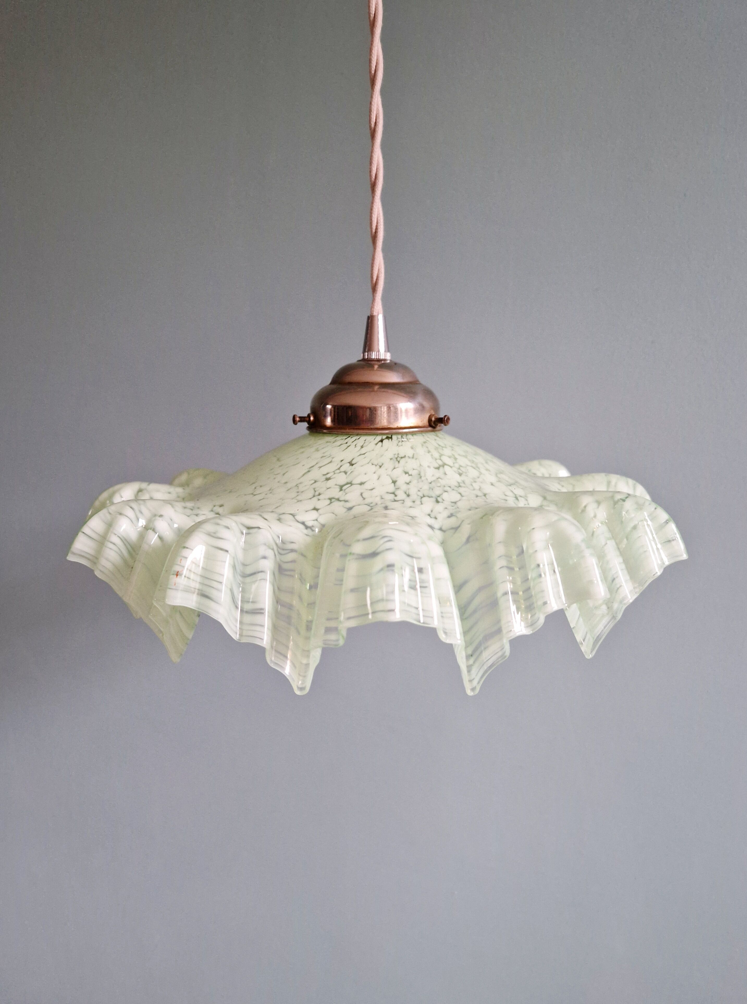 Art Deco pendant light in speckled green and white pleated glass, 1920s-30s.