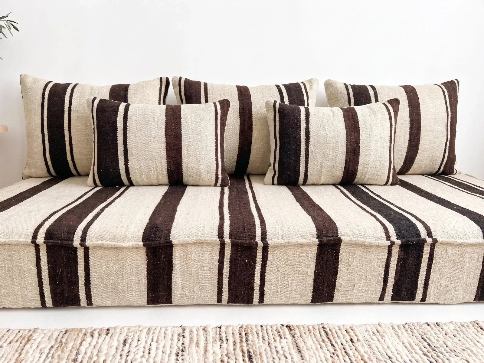 Brown striped kilim floor cushion – handwoven wool, cream base