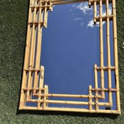 Large sculptural mirror handmade from natural bamboo and woven rattan, 1960.