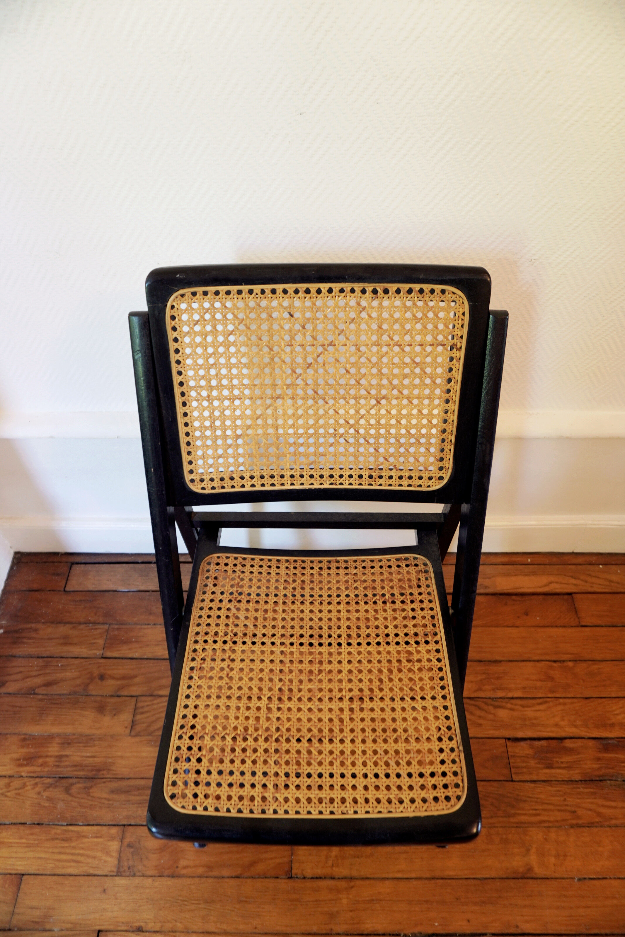 Vintage folding chair from the 60s wood and cannage