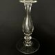 Glass oil lamp blows on foot shower