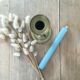 Brass pusher candle holder