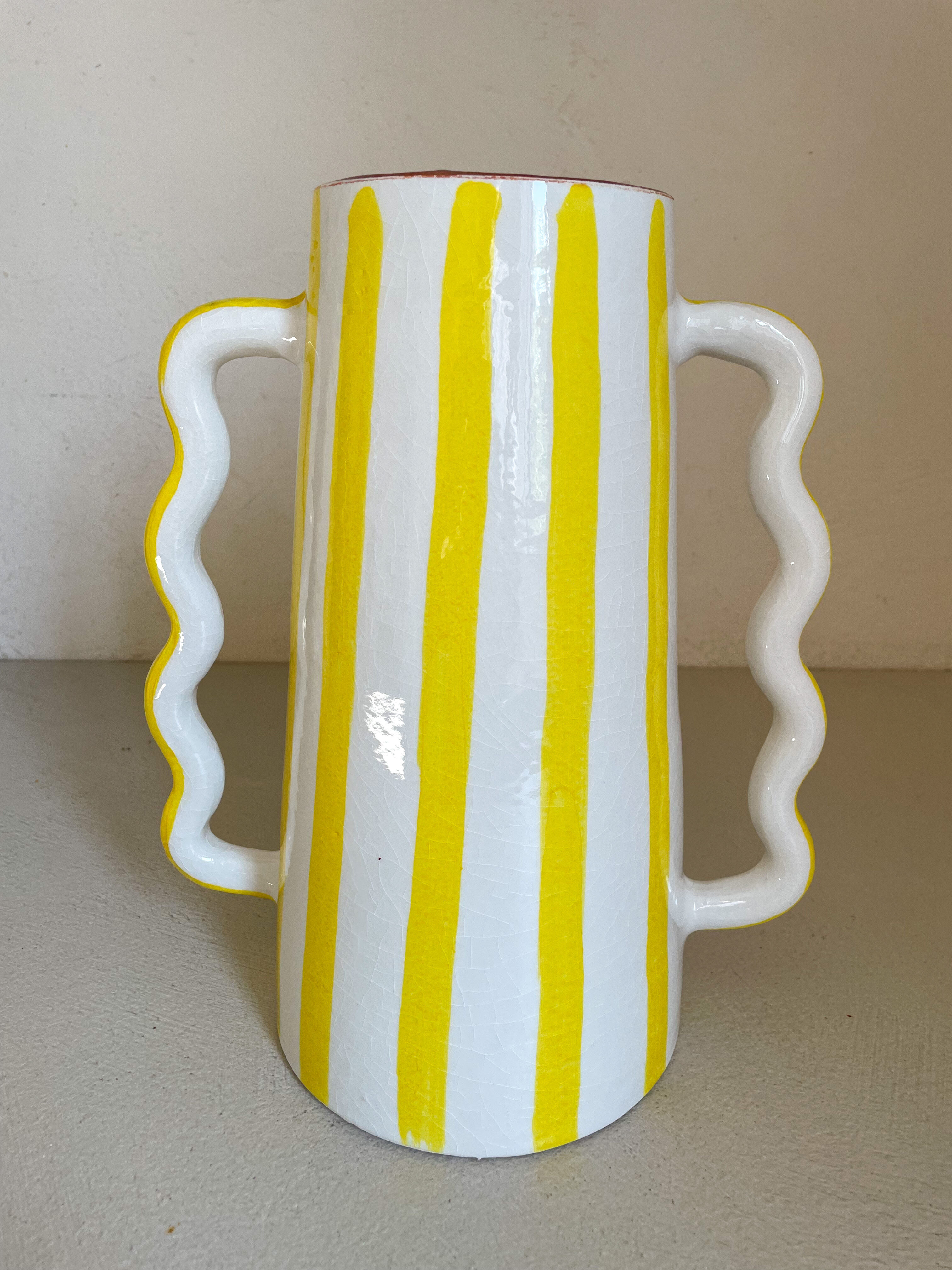Lemon yellow and white striped ceramic vase with abstract wavy handmade handheld