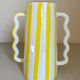 Lemon yellow and white striped ceramic vase with abstract wavy handmade handheld