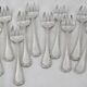 Ercuis Trianon, Rubans, 12 silver-plated oyster forks, excellent condition.