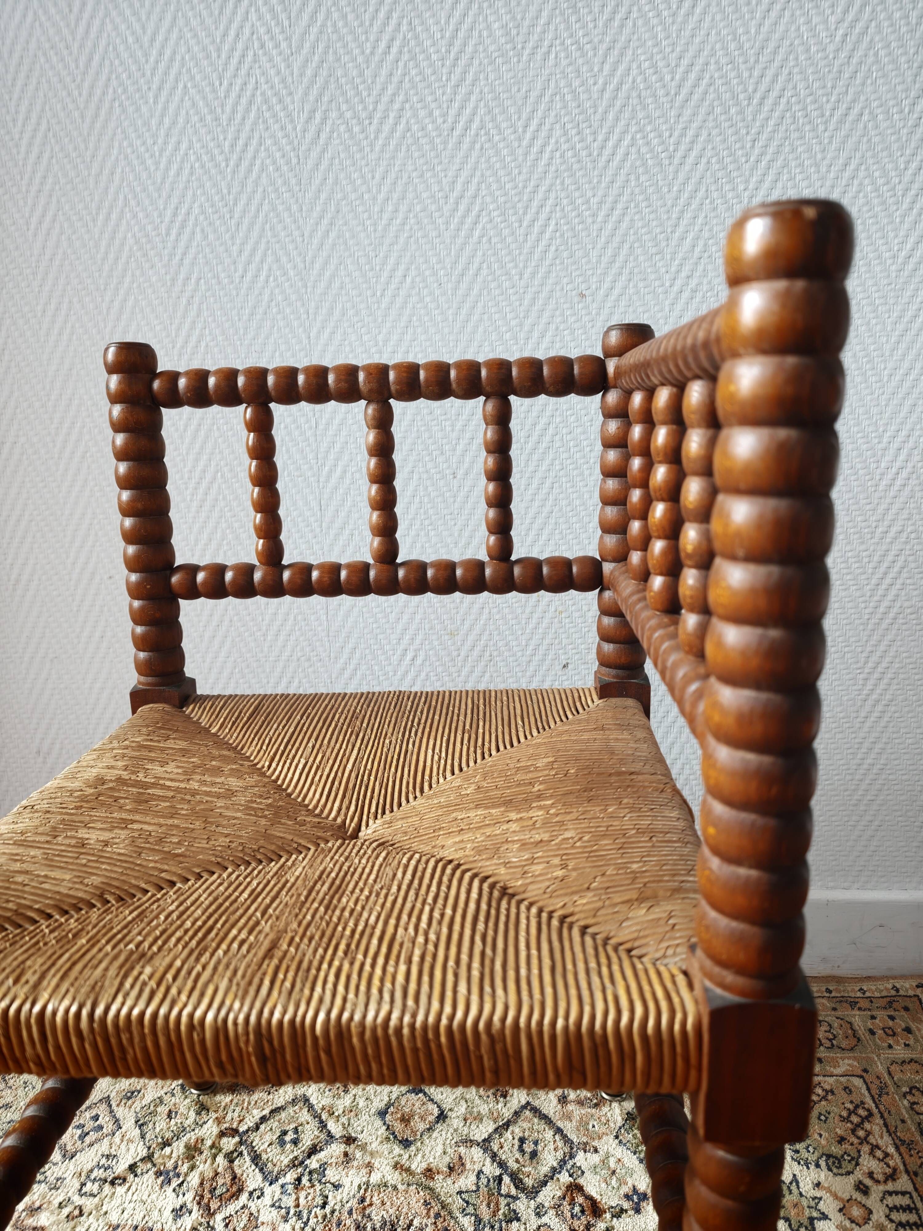 Chaise vintage coin du feu en bois tourné bobine