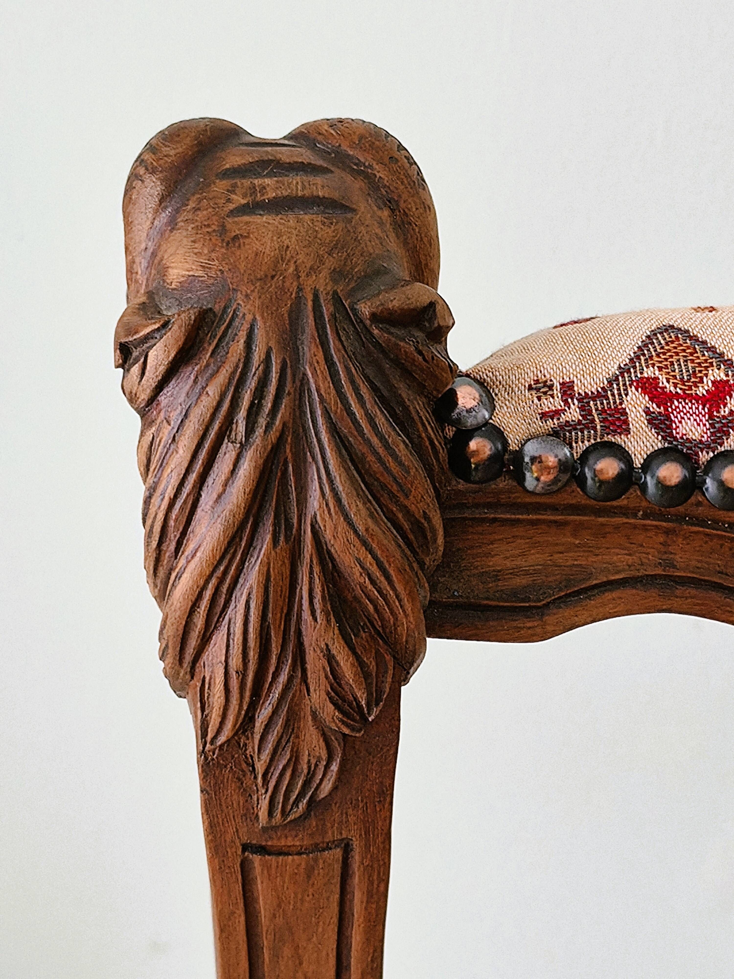 Neo-Renaissance banquette style with lion heads
