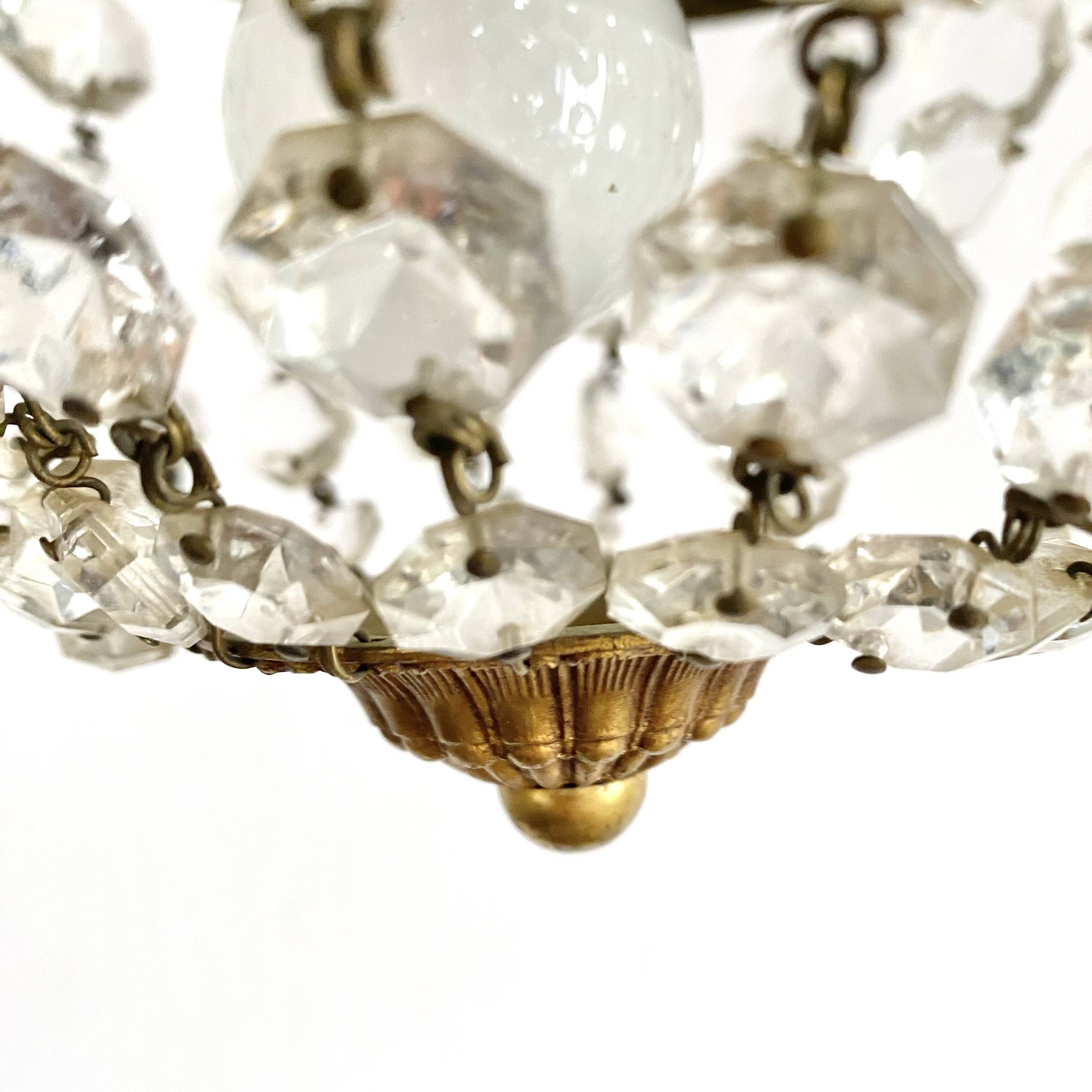 Old ceiling light with tassels and brass