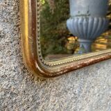 Louis-Philippe mirror gilded with gold leaf