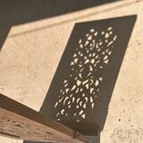 Rectangular Indonesian construction element with blue and yellow plant in carved wood