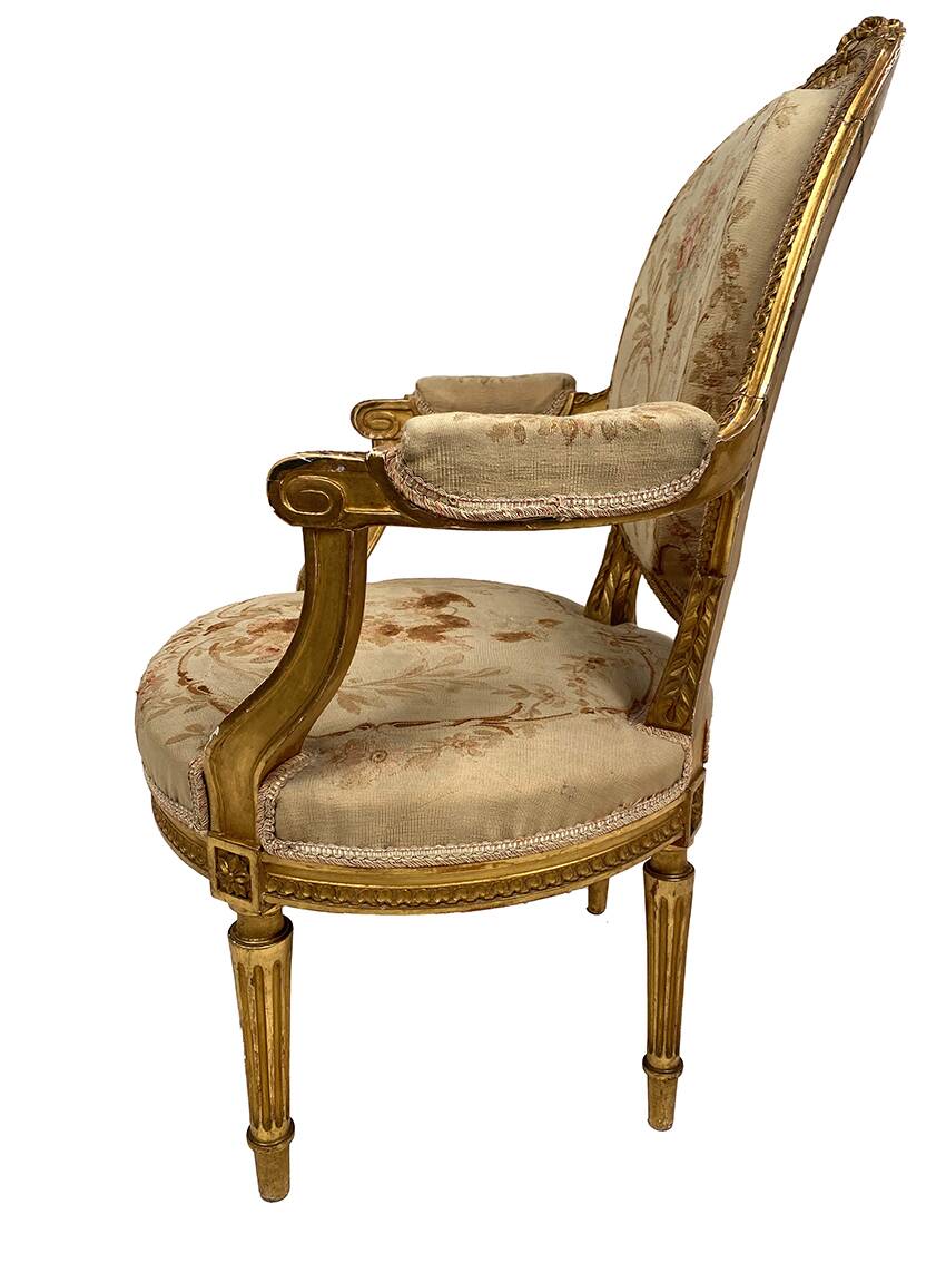 Louis XVI style gilded wood armchair, late 19th or early 20th century