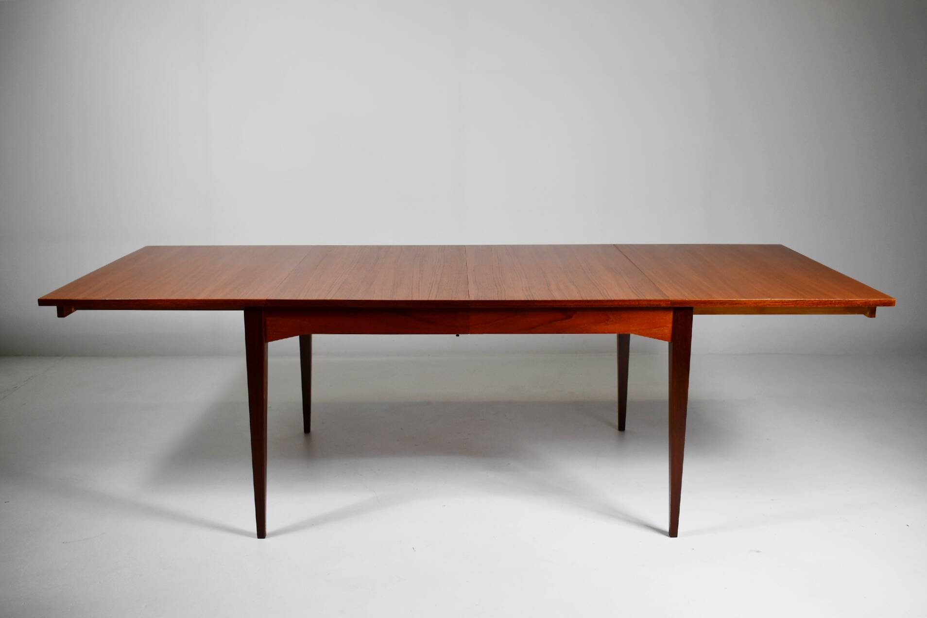 Large teak dining table. 1960s.