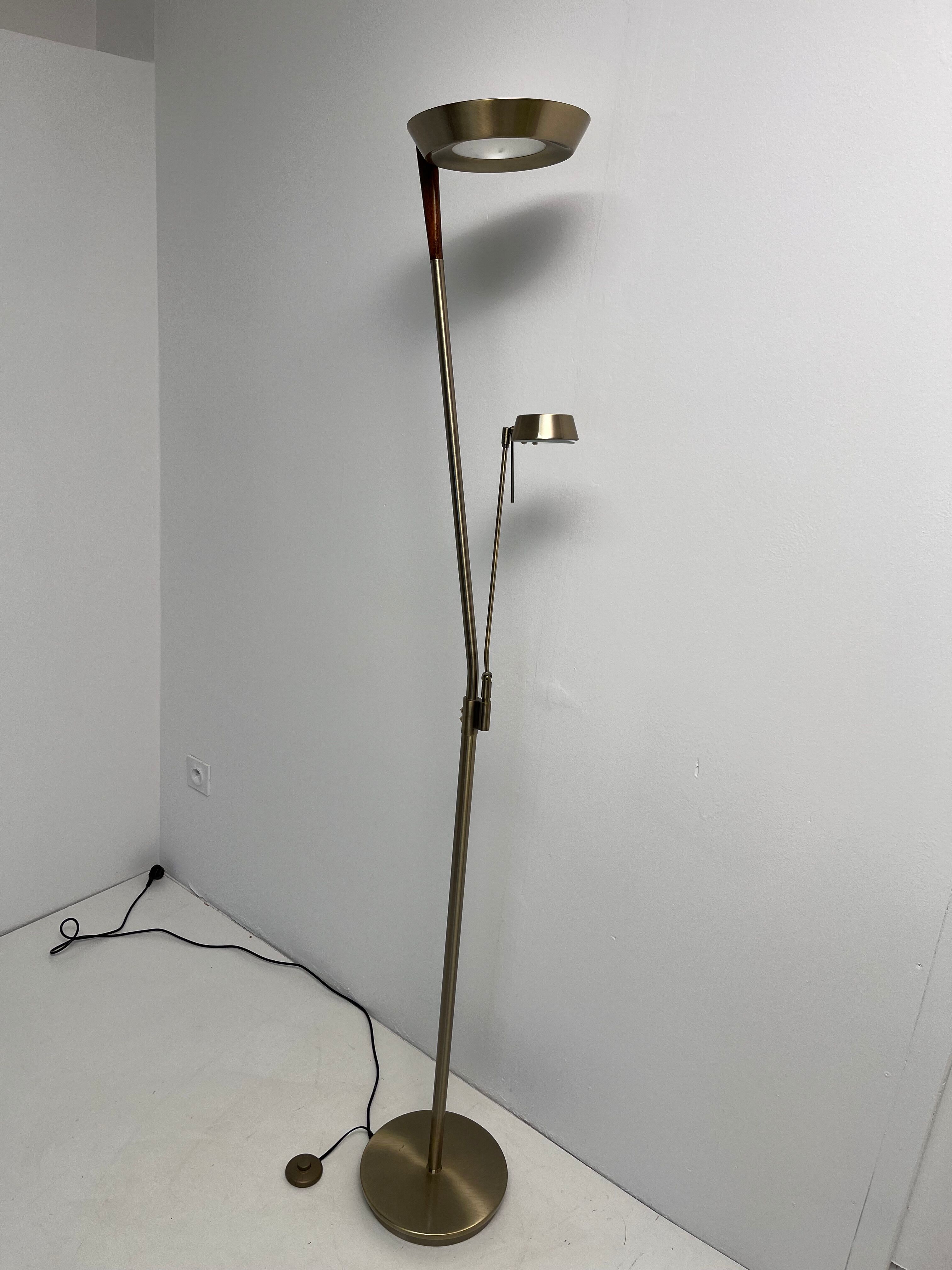 Golden metal floor lamp with reading light