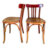Pair of red Fischel chairs