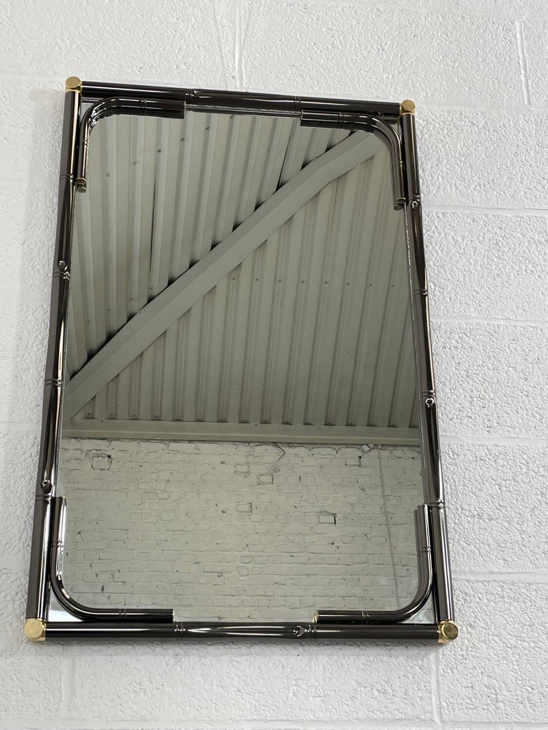 Miroir en métal noir et laiton finission canon de fusil