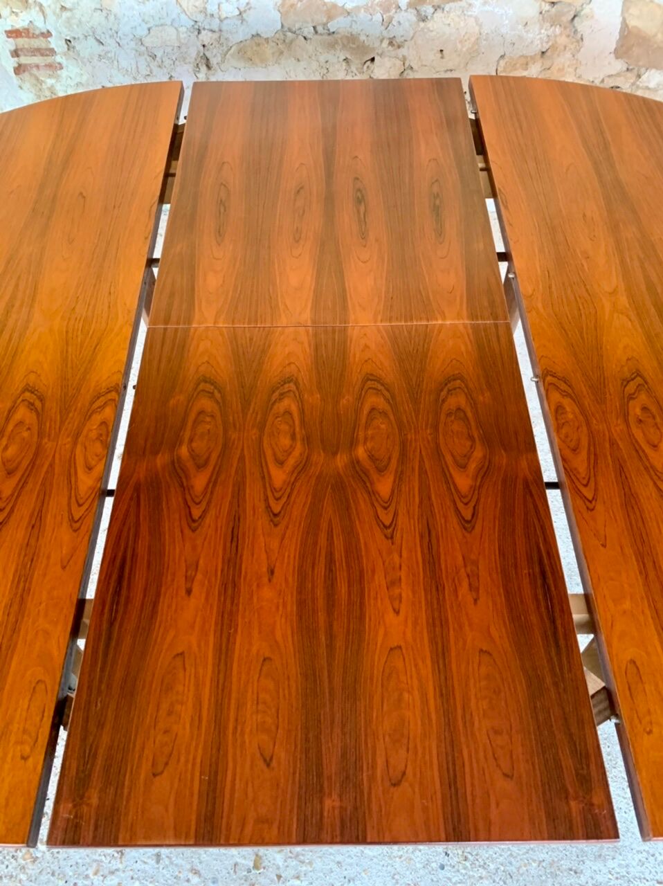Extendable dining table with butterfly extensions in rosewood circa 60's