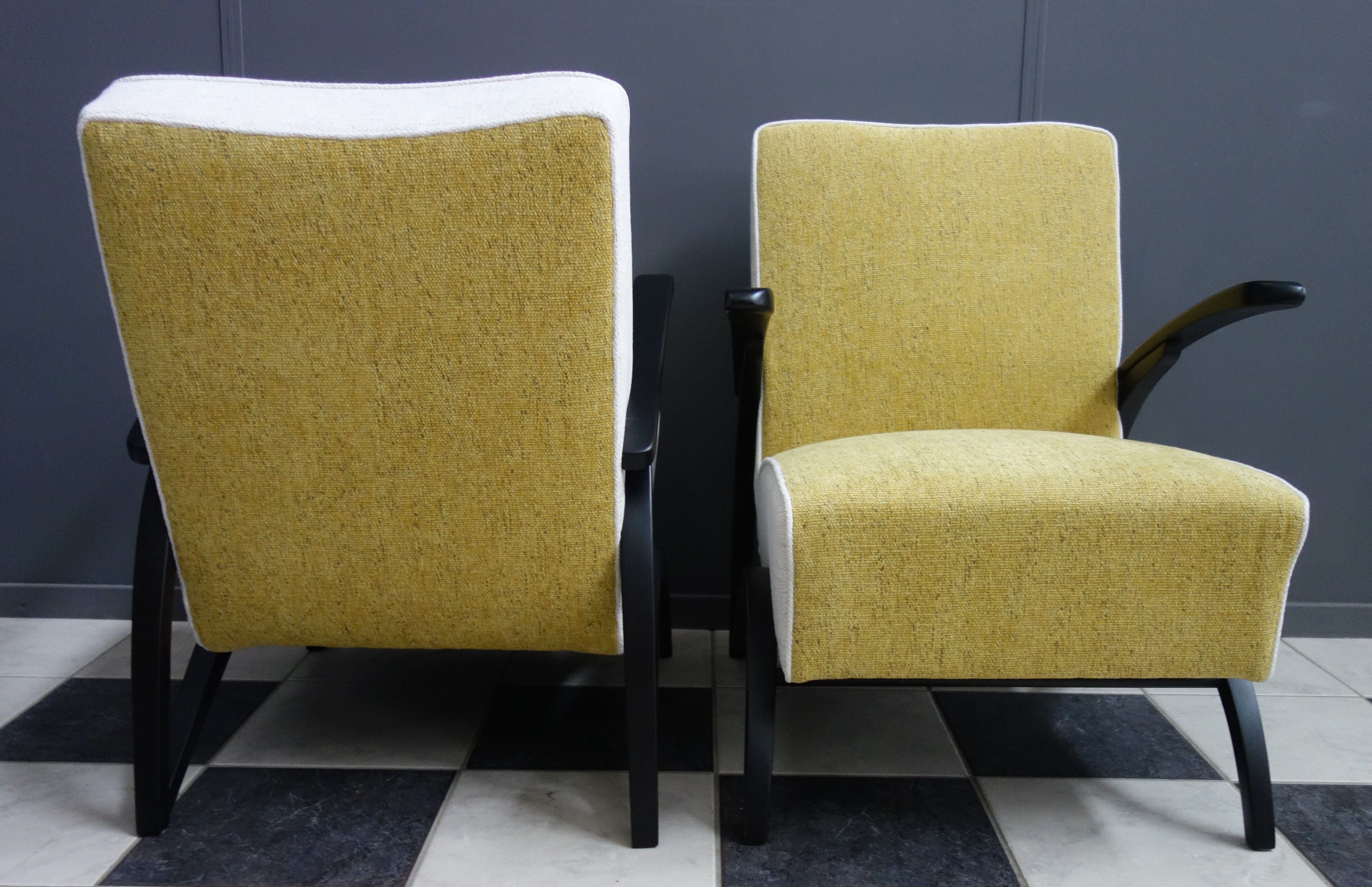 Jindrich halabala chairs yellow and white