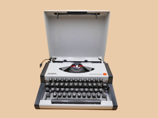 Machine à écrire olympia traveller de luxe blanche vintage révisée