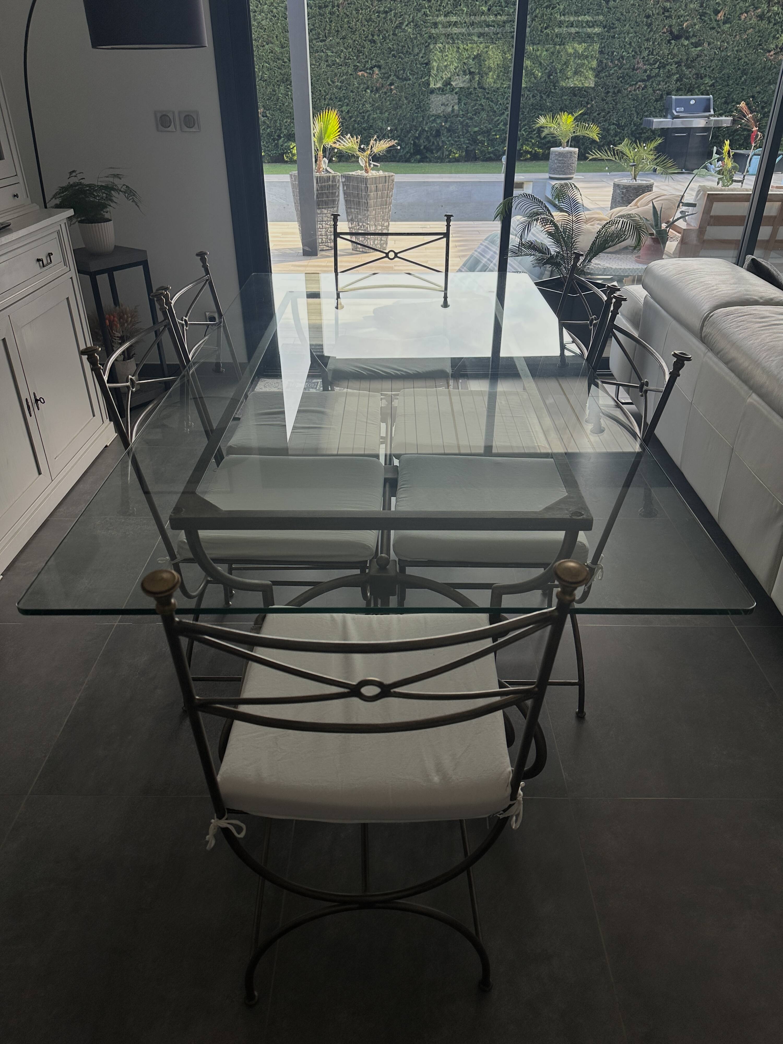 Roche Bobois glass and steel dining table and 6 chairs