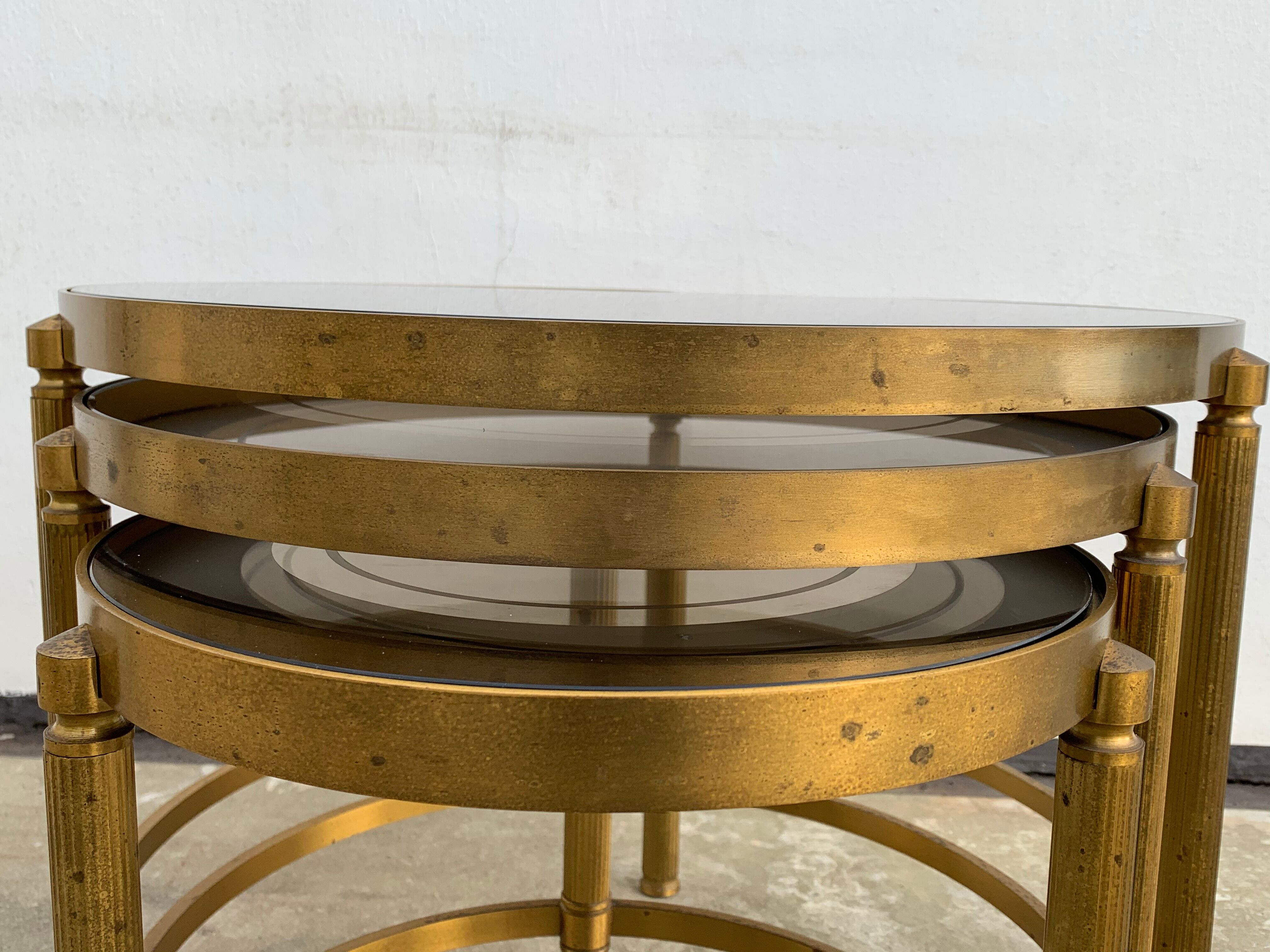 Three round brass tables 1970