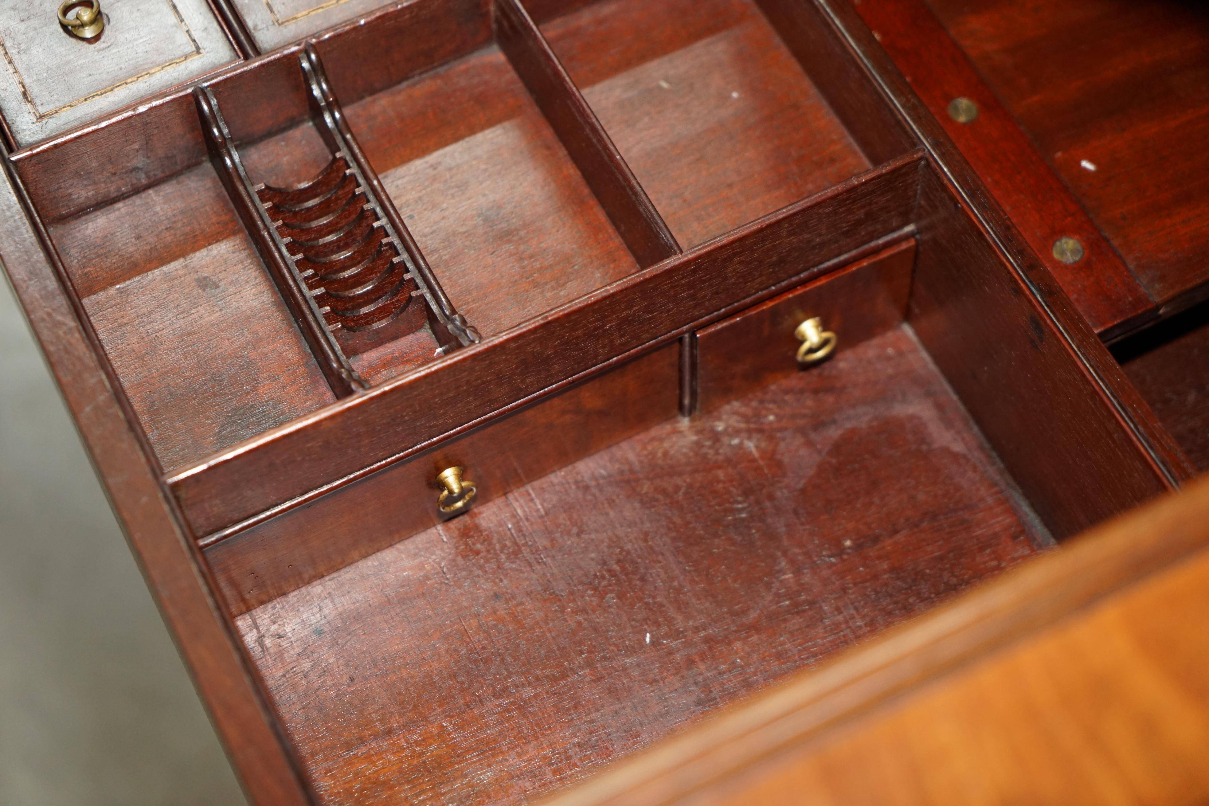 George III commode circa 1770 in walnut by Thomas Chippendale.