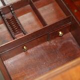 George III commode circa 1770 in walnut by Thomas Chippendale.