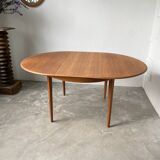 Scandinavian round teak table with extension