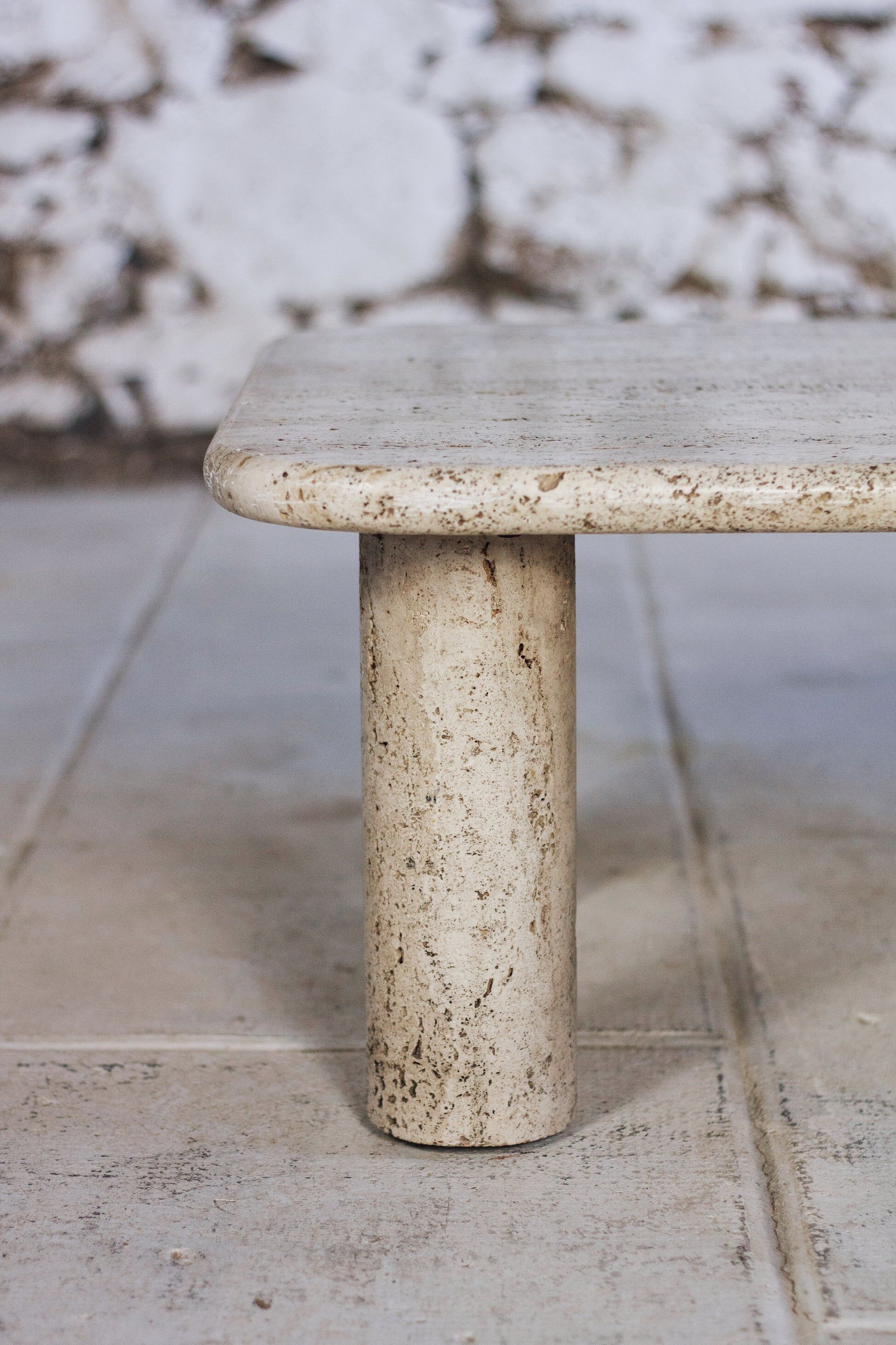 Travertine coffee table in the style of Angelo Mangiarotti, 1970.