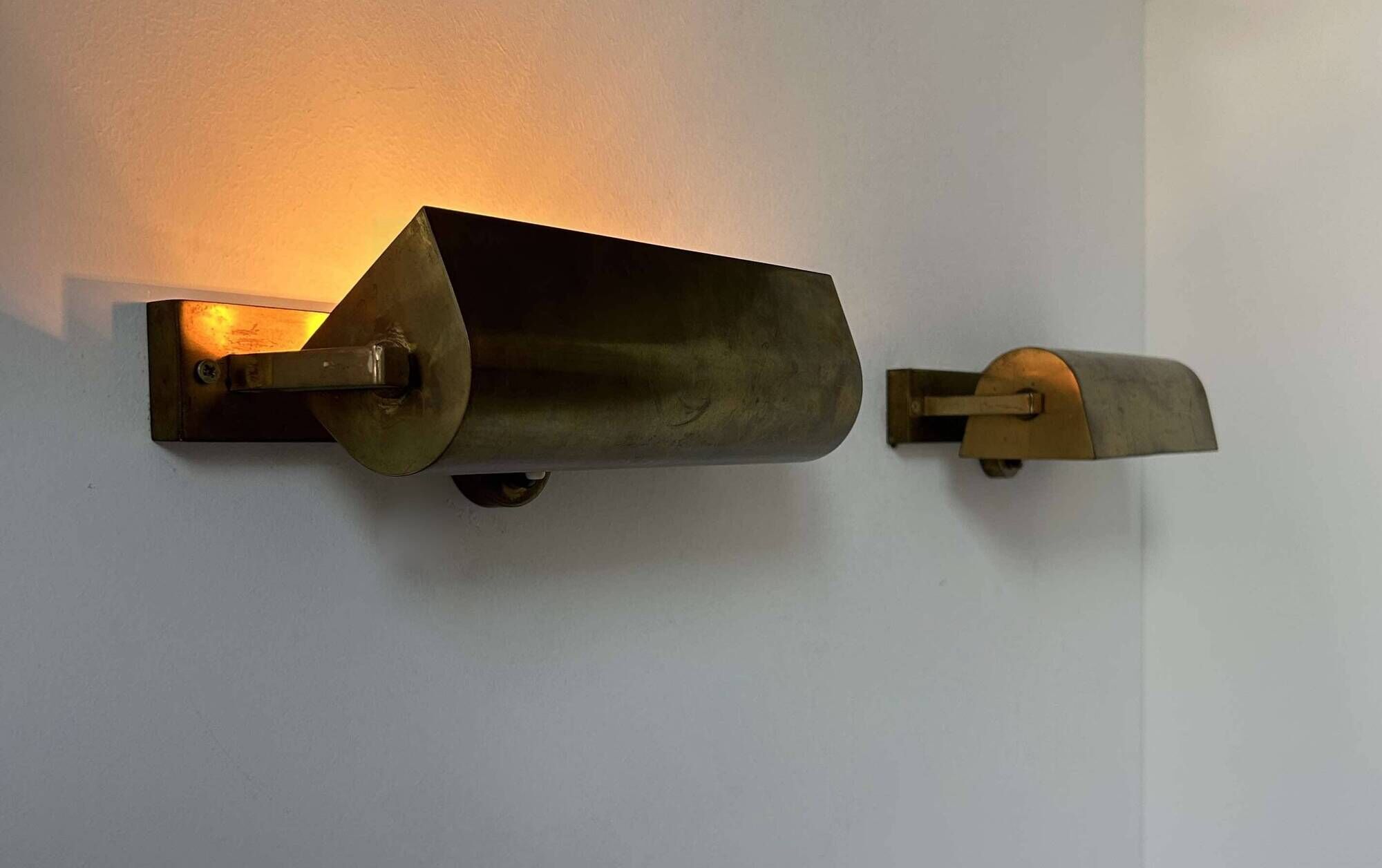 Pair of vintage modernist wall lights, adjustable in brass, France 1940