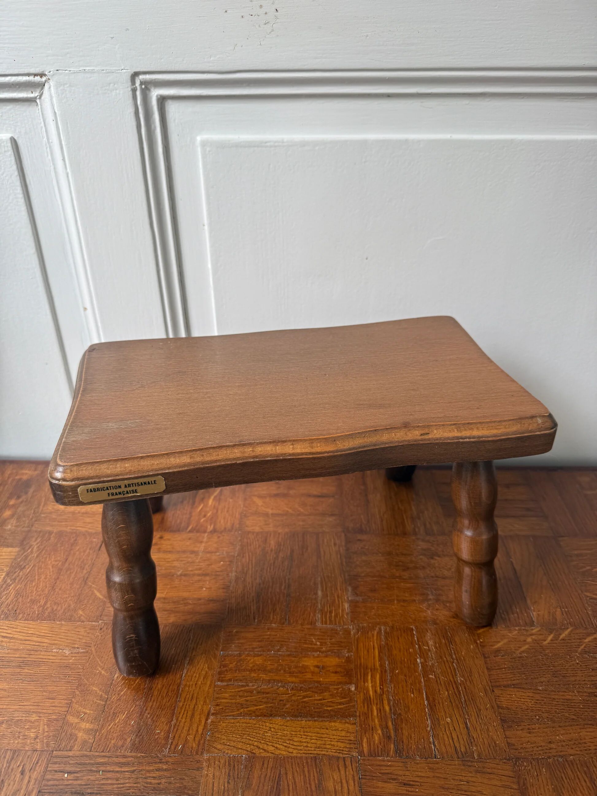 Old wooden milking stool
