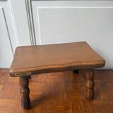 Old wooden milking stool