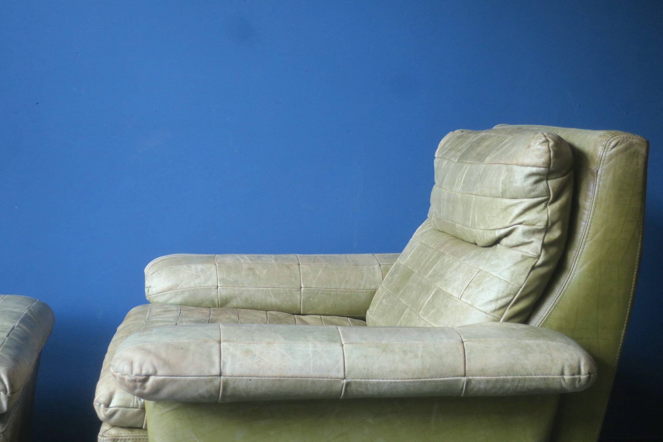 Patchwork leather olive green lounge chair and ottoman by Laauser, 1970s