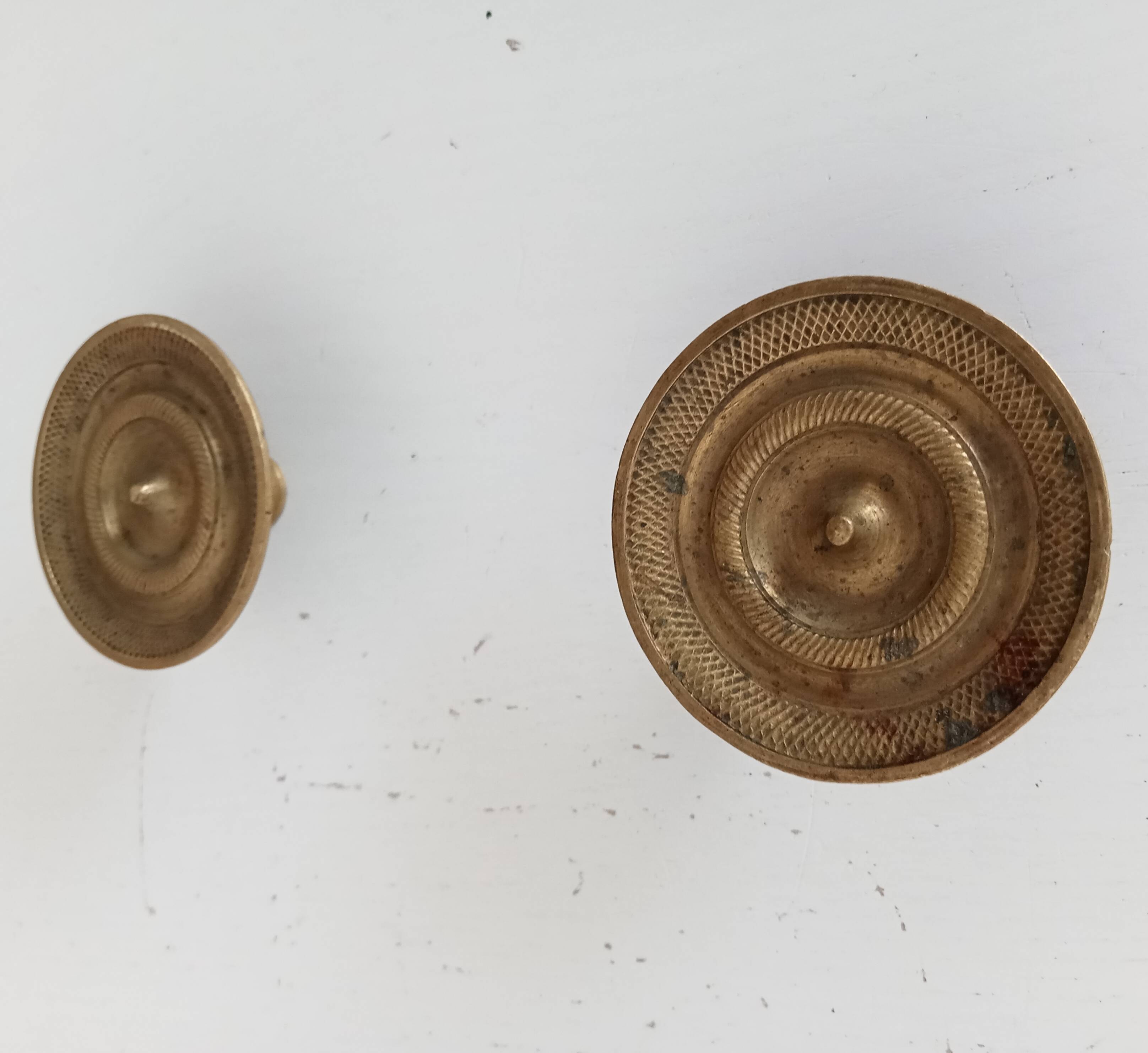 Pair of antique Empire furniture knobs in bronze from the 19th century.