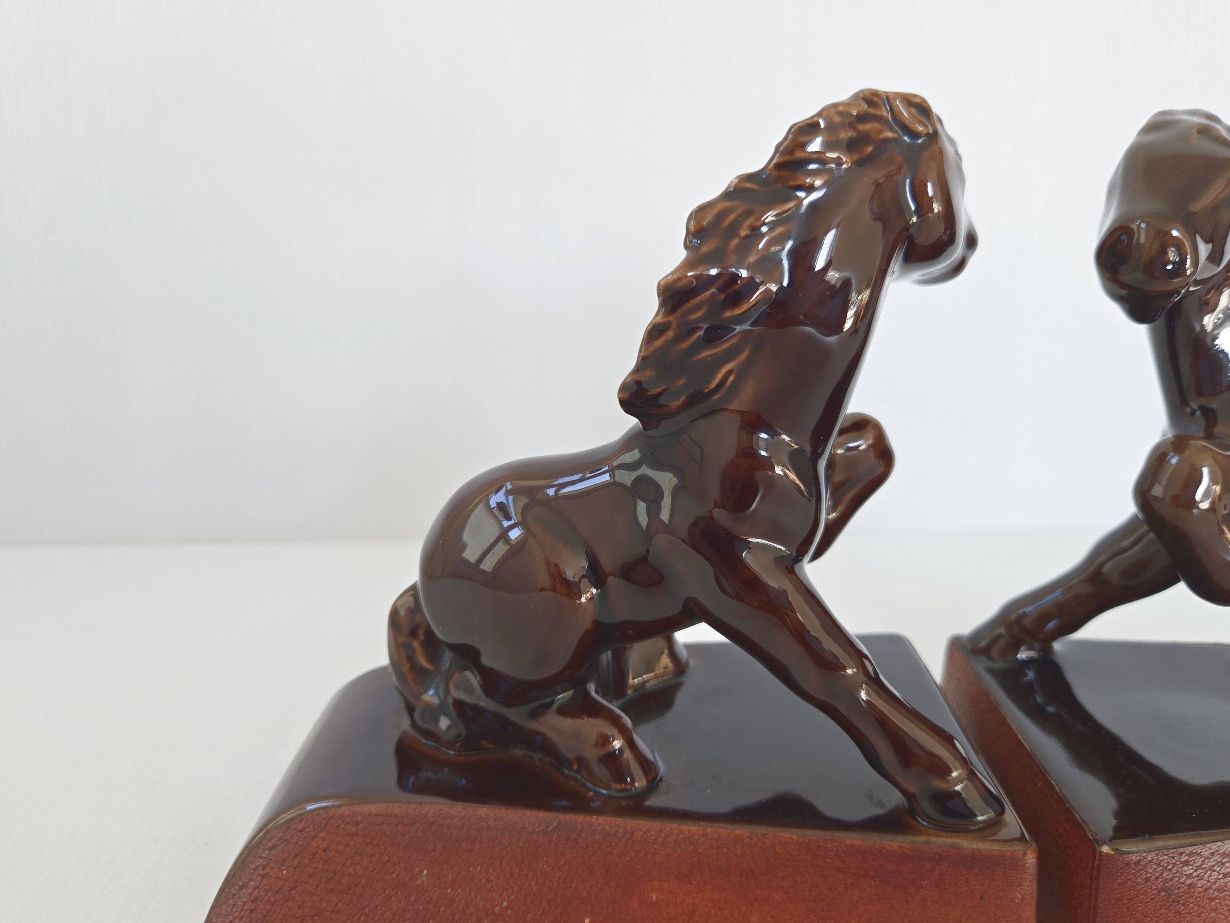 Pair of vintage leather & ceramic bookends