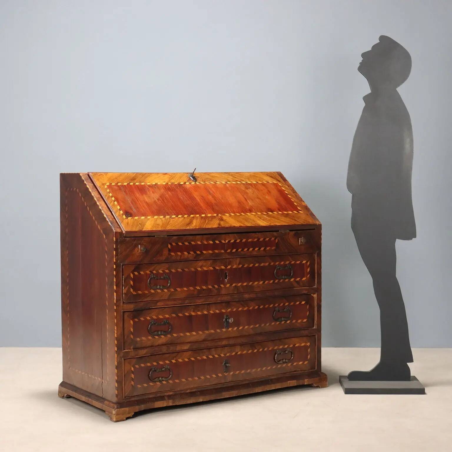 Antique drop-leaf cabinet in various types of wood, Italy, 18th century.