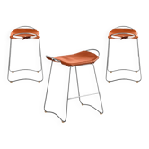 Set of 3 contemporary stools made of aged silver steel and natural tobacco leather.