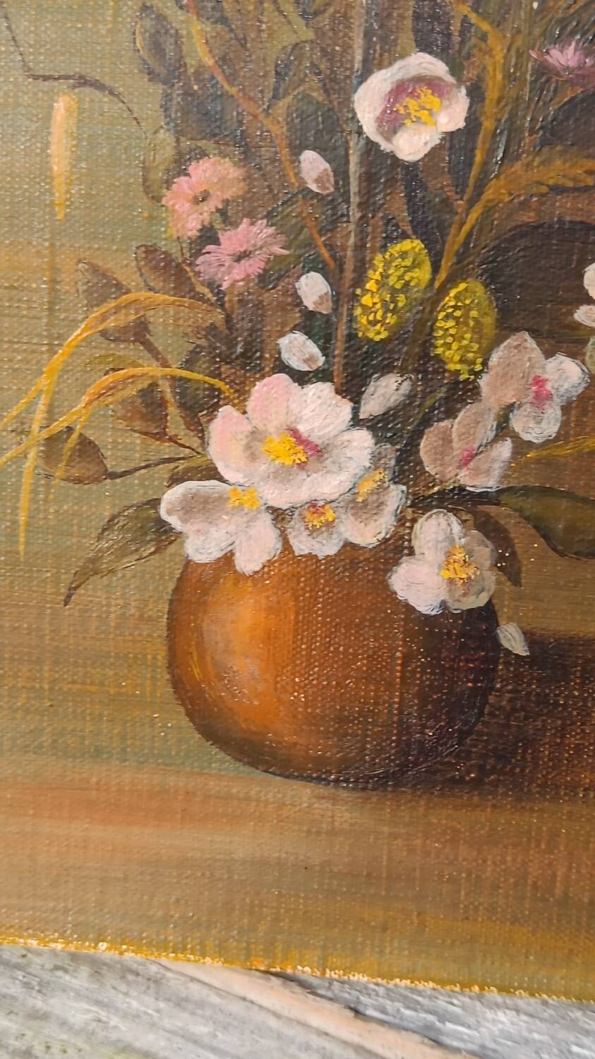 Canvas painting of a bouquet of flowers.